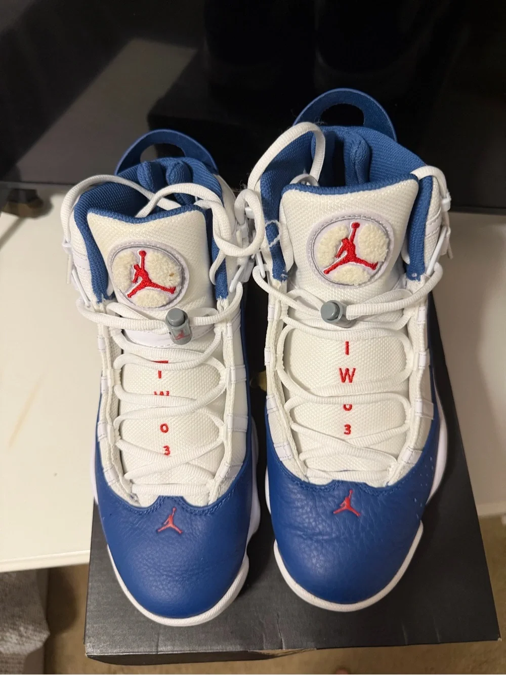 Jordan men’s White, Blue & Red Retro Basketball Sneakers worn twice like new